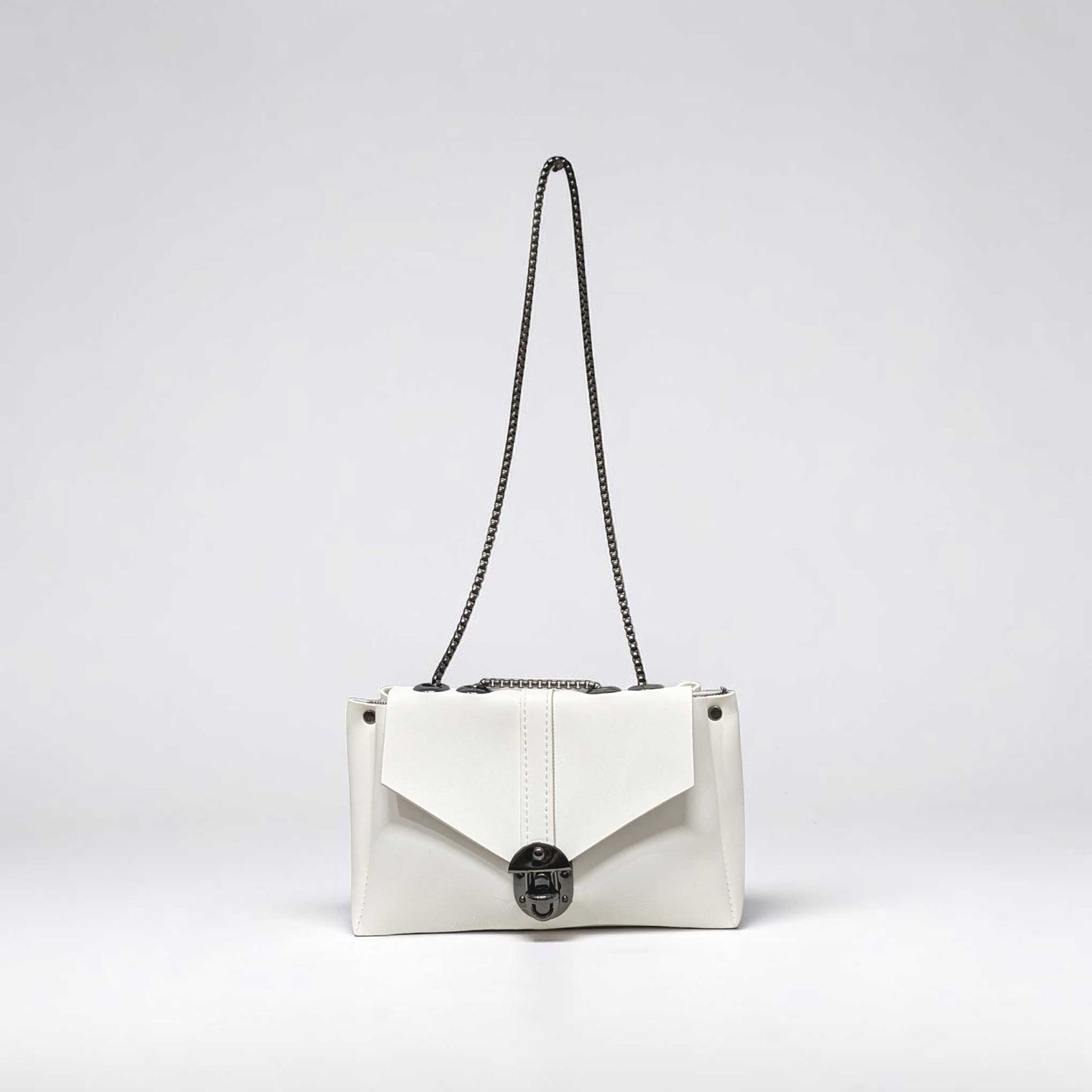 White handbag with a chain strap on a light gray background